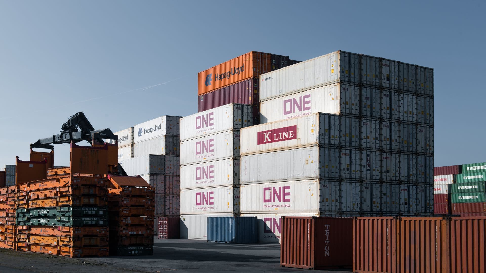 Stacked shipping containers in a yard